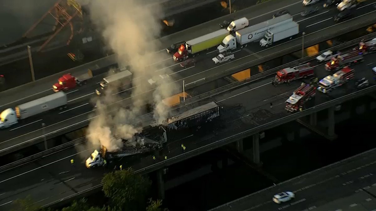 Tractor-trailers burst into flames after crash, backing up NJ Turnpike for hours