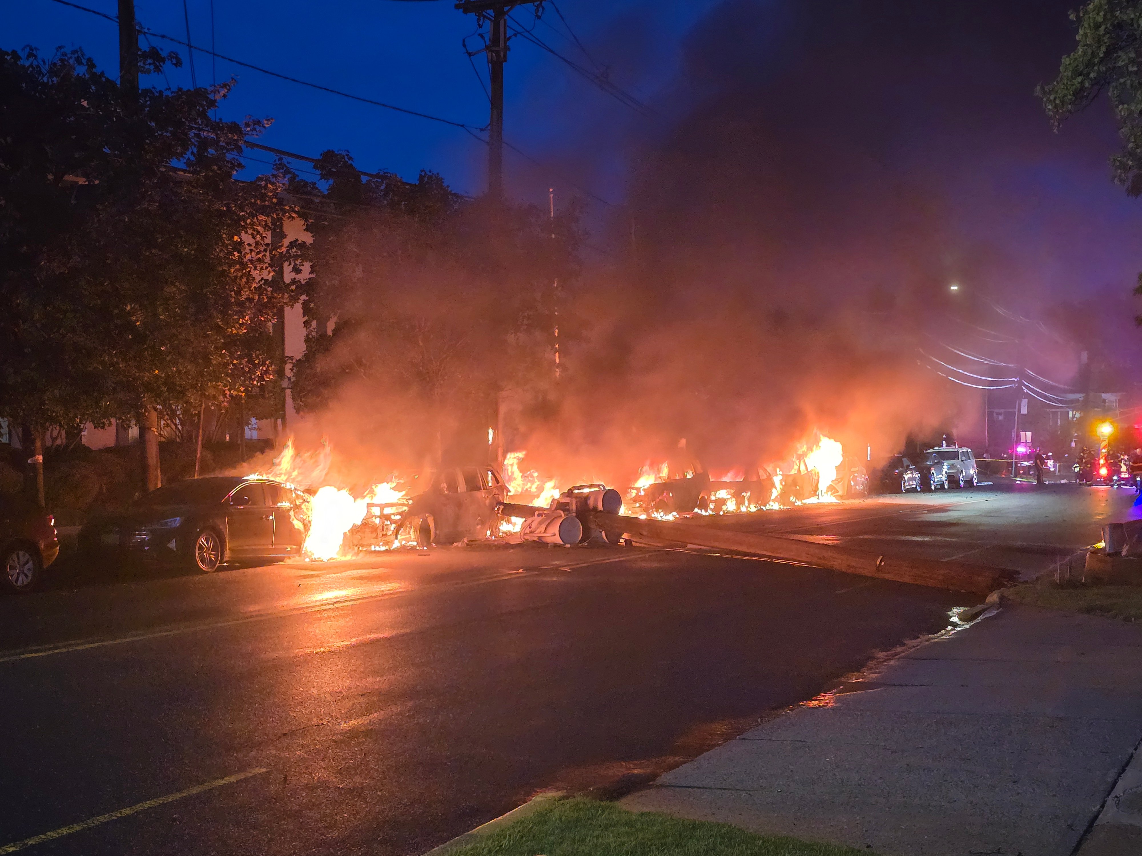 WATCH: Downed power lines set entire block of cars on fire in New Jersey