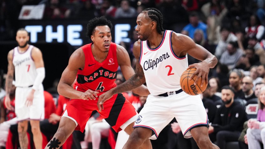 Kawhi Leonard of the LA Clippers is guarded by Scottie Barnes of the Toronto Raptors