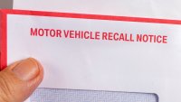 Photo of an envelope containing a vehicle recall notice.