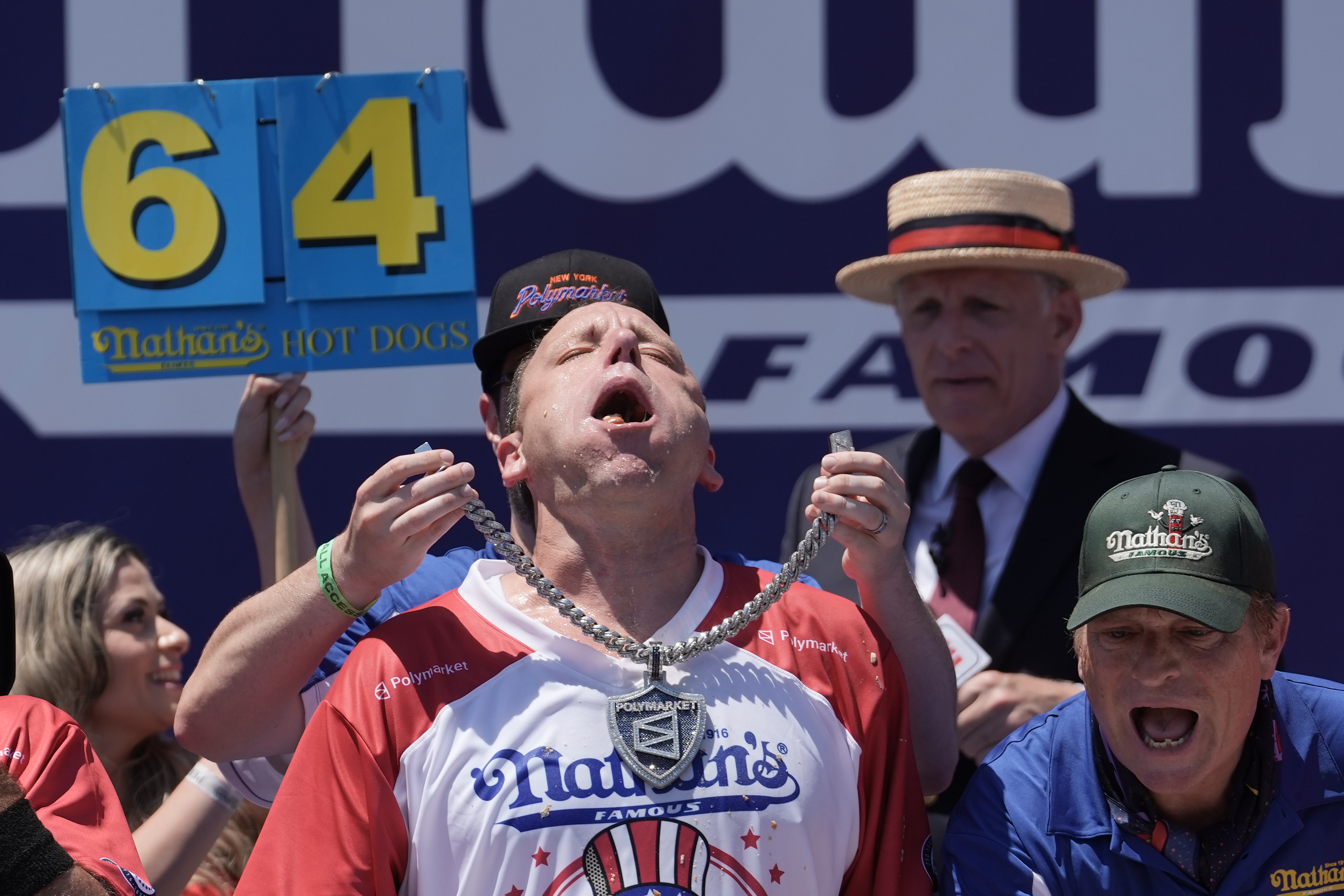 Joey Chestnut eats 66 hot dogs to again claim Mustard Belt at Nathan's Famous contest