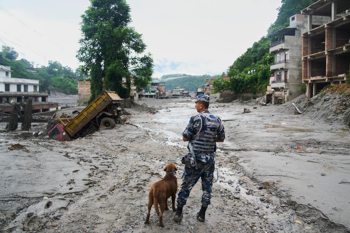 Death toll rises in Nepal-China border disaster as lake poses new flood threat