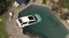 Woman dies after crashing SUV into backyard swimming pool on Long Island, police say