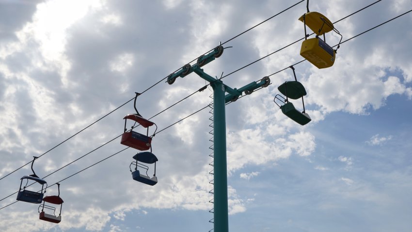 A fairground chair ride against a blue sky in Iowa, U.S. Photographer: John Taggart/Bloomberg