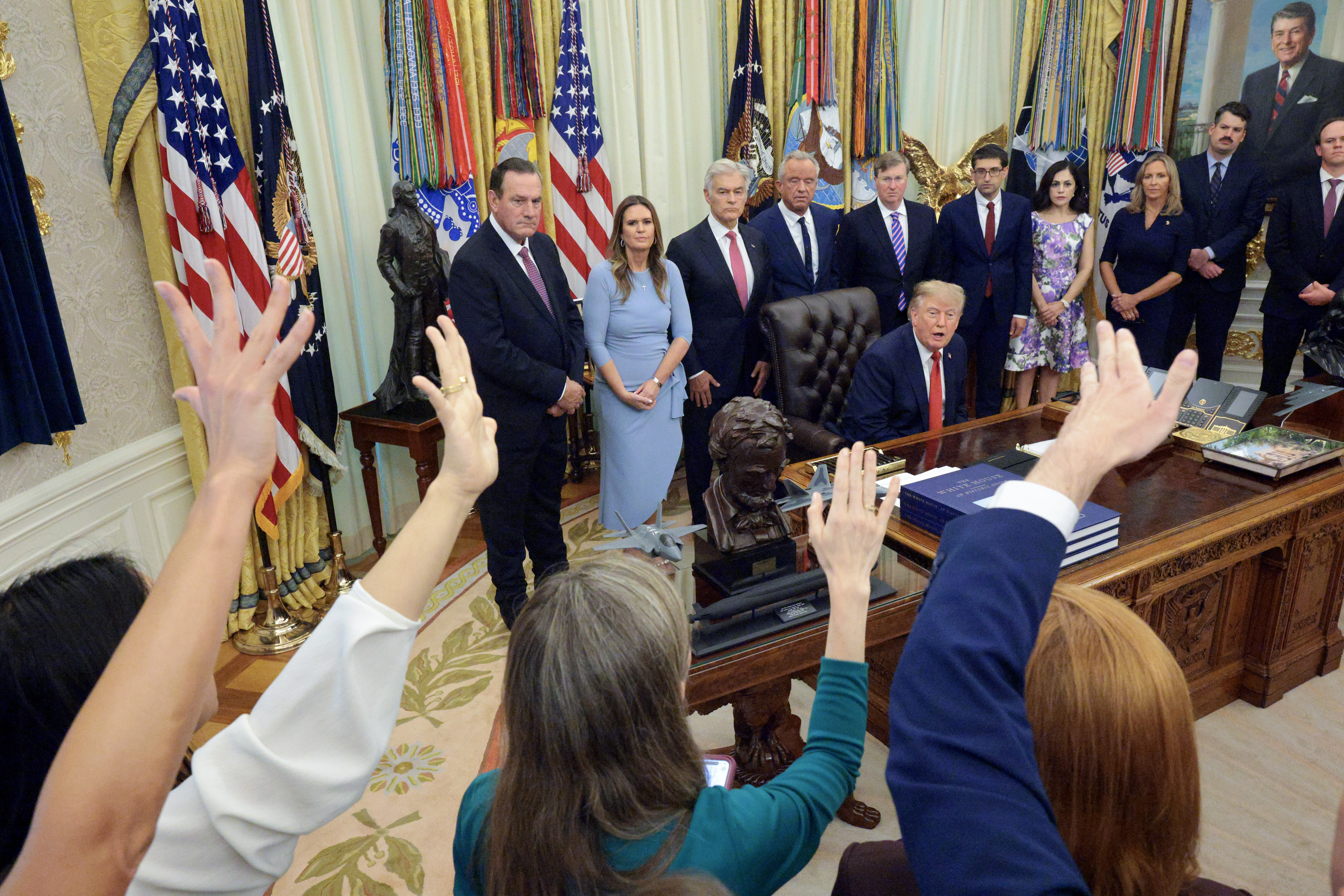 Defending Trump media ban, DOJ cites national security and says White House access is a ‘privilege'