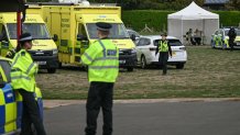 Police are pictured at a base set up at the Fairford Youth Football Club near RAF Fairford base, south-west England on September 27, 2026, as UK counter-terrorism police investigate an incident near the base in the village of Whelford. British police on September 27 declared a major incident and evacuated villagers living near a base used by the US air force after arresting several men on suspicion of explosives offences. (Photo by JUSTIN TALLIS / AFP via Getty Images)