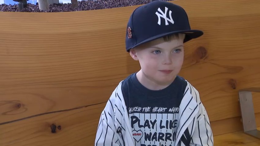 Walker Farrington, wearing a Yankees cap, jersey and shirt.