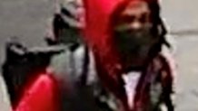 Police released photos of a suspect in Saturday's deadly shooting on a midtown subway platform