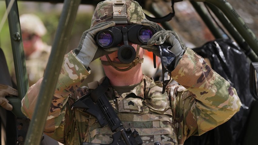 U.S. Army personnel keep watch over the U.S.-Mexico border in Roma, Texas, Oct. 8, 2026.