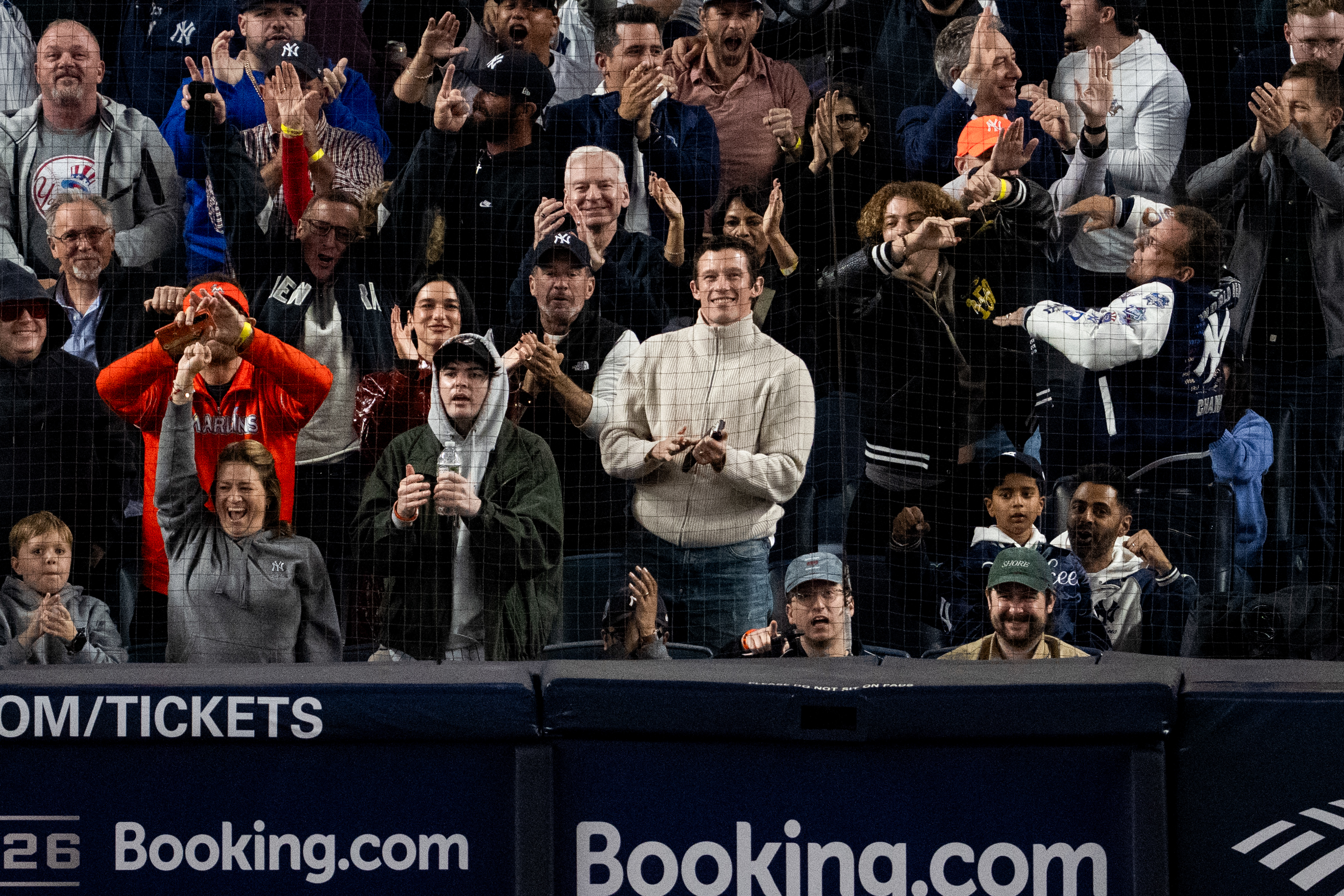 Dua Lipa sits next to Marlins Man in hilarious crossover at Yankee Stadium