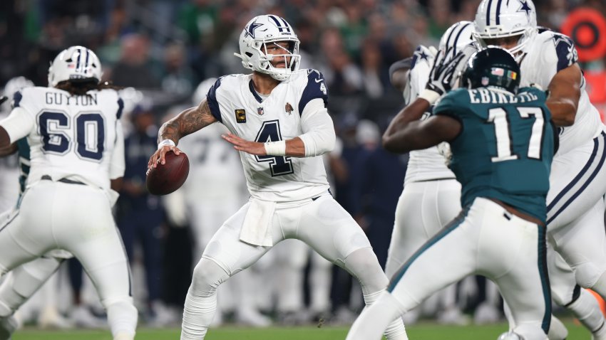 Dak Prescott #4 of the Dallas Cowboys throws a pass.