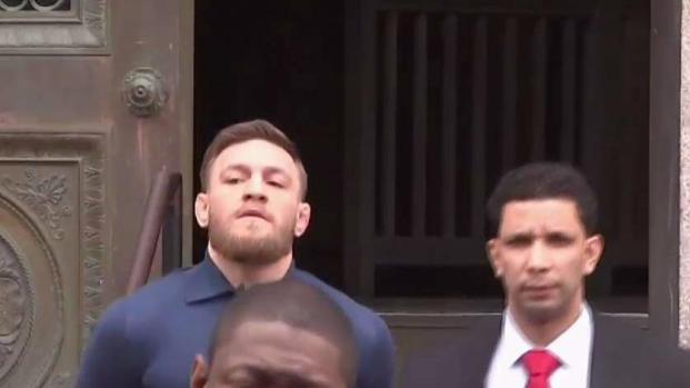 Handcuffed Conor McGregor Led From NYC Precinct After Arrest