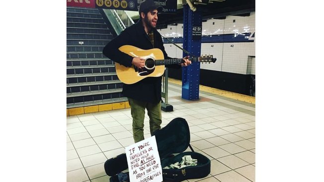 Generous Guitar-Playing Busker Creates 'Hopeful Cases' for NYC's Homeless