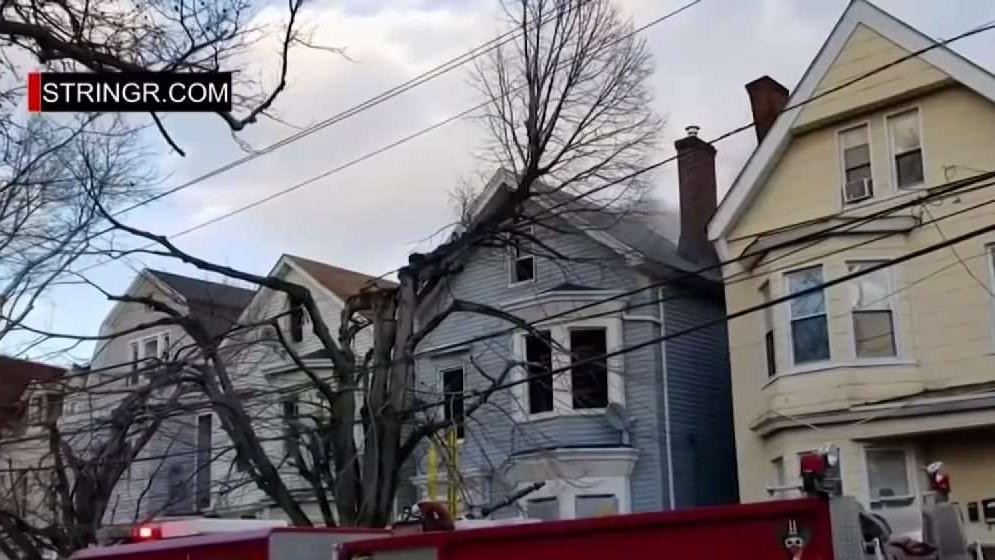 Firefighters Rescue Girl Trapped in Burning NJ Building