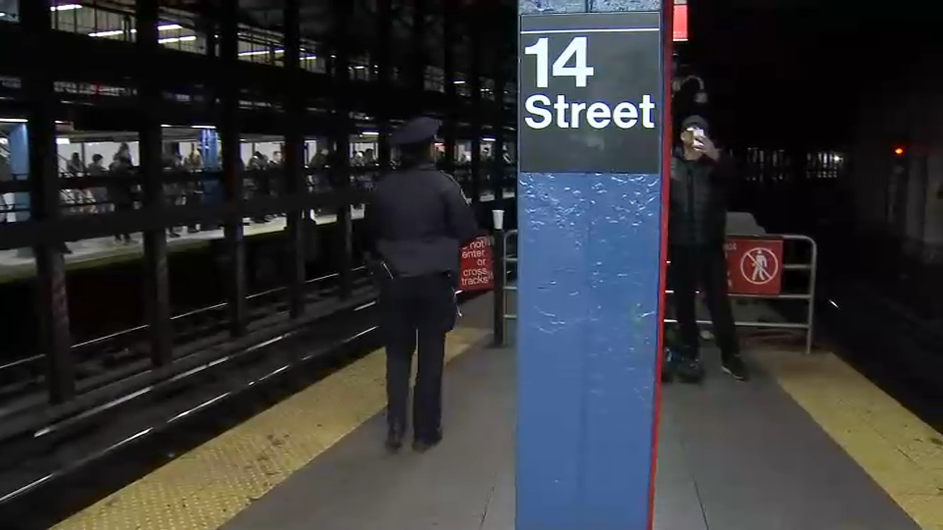 Woman Rescued After She's Pushed Onto Subway Tracks: Sources
